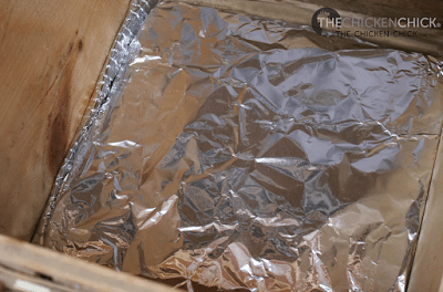 Wrap the warmed Nest Box Cozy in heavy duty aluminum foil (protects it from becoming soiled) and place it on top of the insulation. 