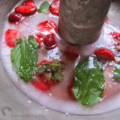When the strawberries are frozen to the bottom of the pan, add strawberry puree to the pan and freeze until solid.