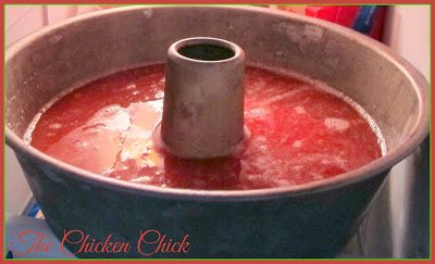 When the strawberries are frozen to the bottom of the pan, add strawberry puree to the pan and freeze until solid.