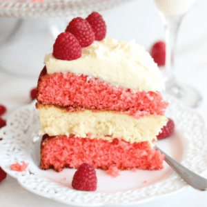 Raspberry White Chocolate Cheesecake Cake, shared by The Gold Lining Girl
